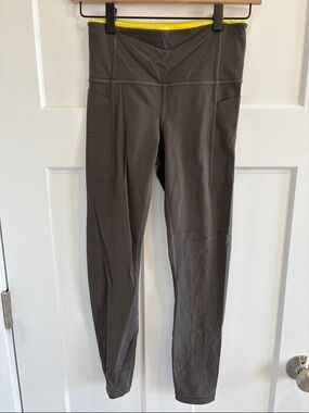 Athleta Charcoal Leggings with Yellow Waistband Accent